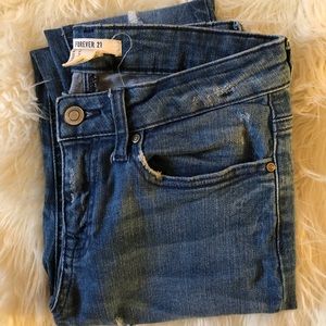 slightly distressed skinny jeans